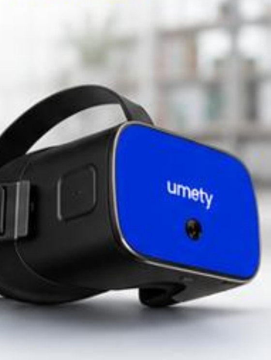 A close-up of the Umety VR headset resting on a table