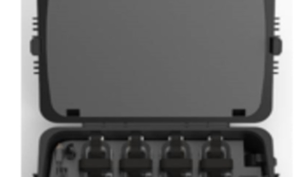 A close-up of an open Umety carrying case, showing four of its eight padded charging slots for VR headsets and controllers